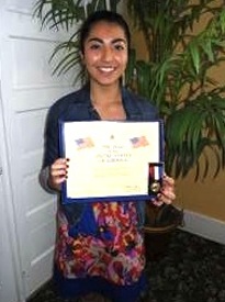 Vania Bustamante of Seabreeze HS in Ormond Beach received an award from the Daughters of the American Revolution / Headline Surfer®
