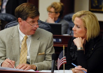 State Rep. Dave Hood confers with college Katie Edwards of Plantation / Headline Surfer®