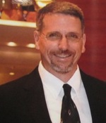 Mark Severance, New Smyrna Beach p[olice officer and father / Headline Surfer