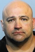 Sanford PD Lt Joseph Santiago arrested onb felony charge after asllegedly headbutting & punching girlfriend while barhopping in Daytona / Headline Surfer®