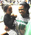Brianti Saunders of Stetson University with kid sister after scoring single-game revcord 40 points / Headline Surfer®