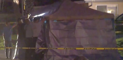 A tent was placed over the body of a South Daytona man gunned down last month in the street / Headline Surfer