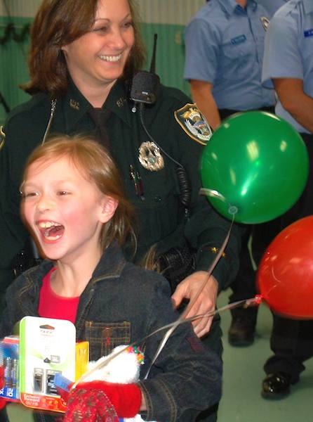 Volusia County Sheriff's deputies provide Christmas for kids in DeLand, FL / Headline Surfer®