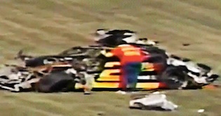 Rusty Wallace's car is destroyed in the 2nd 1983 Twin 125 qualifier / Headline Surfer