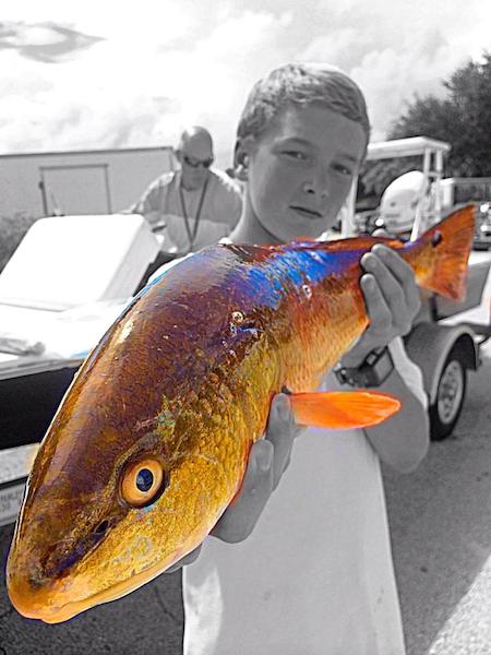 Dawson Porter, 2, caught this 26-inch redfish in New Smyrna Beach, FL / Headline Surfer®