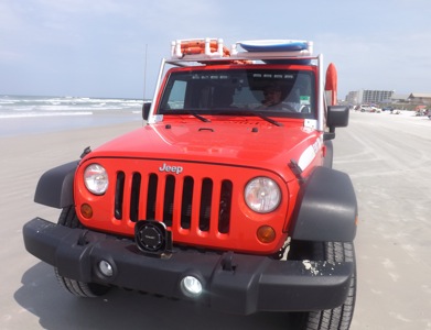 Beach Patrol Jeep on NSB / Headline Surfer