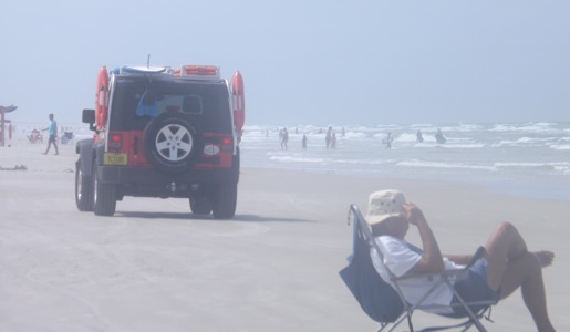 Beach Patrol Jeep on the move in NSB / Headline Surfer