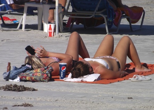 Sunbathing on the World's Most Famous Beach, Daytona Beach, Fla. / Headline Surfer®