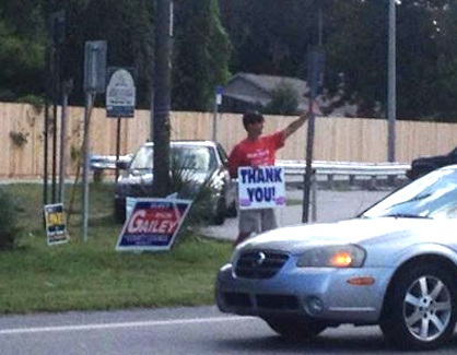 Rich Gailey waves to passersby on primary night in DeBary / Headline Surfer®