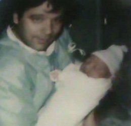 Henry Frederick with his son, Henry Frederick, IV, as a newborn on Oct 16, 1993 / Headline Surfer®