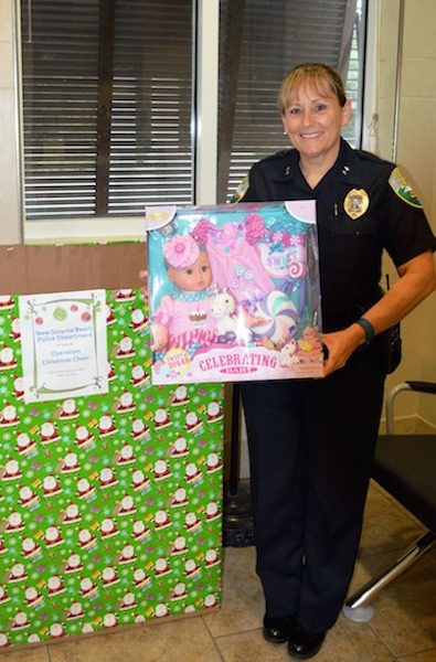 NSBPD Deputy Chief Donna Lavasllee leading Christmas toy, food, clothing drive for needy / Headline Surfer®