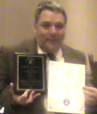 Henry Frederick with firsat place breaking news award from Florida Press Club / Headline Surfer®