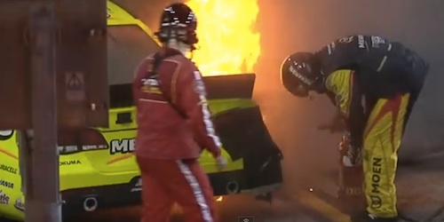 Paul Menard's race car on fire in the pits at Homstead-Miami Speedway in 2013 / Headline Surfer®
