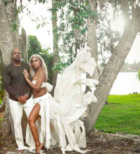 Deputy C. Williams shown with wife & daughter, and Sheriff Dennis Lemma / Headline Surfer