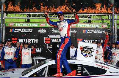 Joey Logano celebrates win at Texas Motor Speedway / Headline Surfer